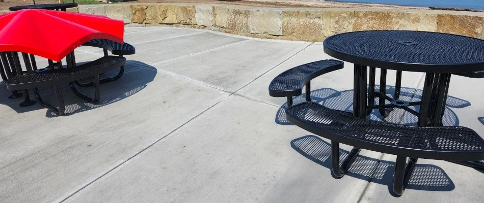 Poured concrete patio in Huron, OH, with seating areas.