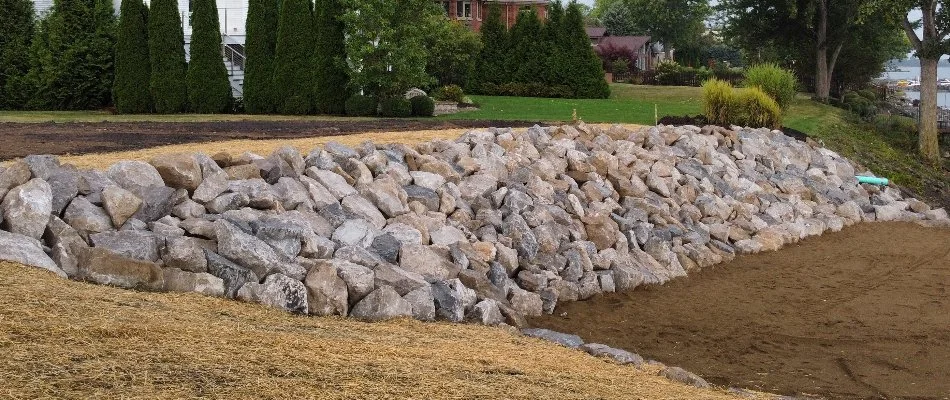 Retaining wall made from boulders in Huron, OH.