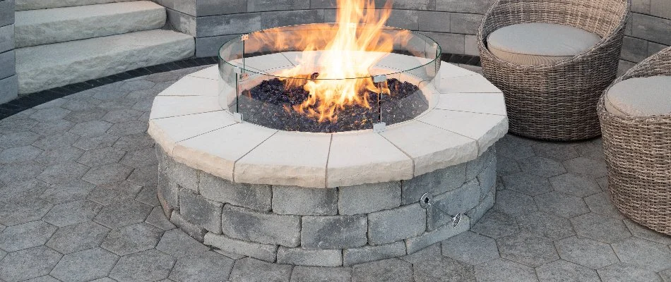 Gas fire pit on a paver patio in Avon, OH.