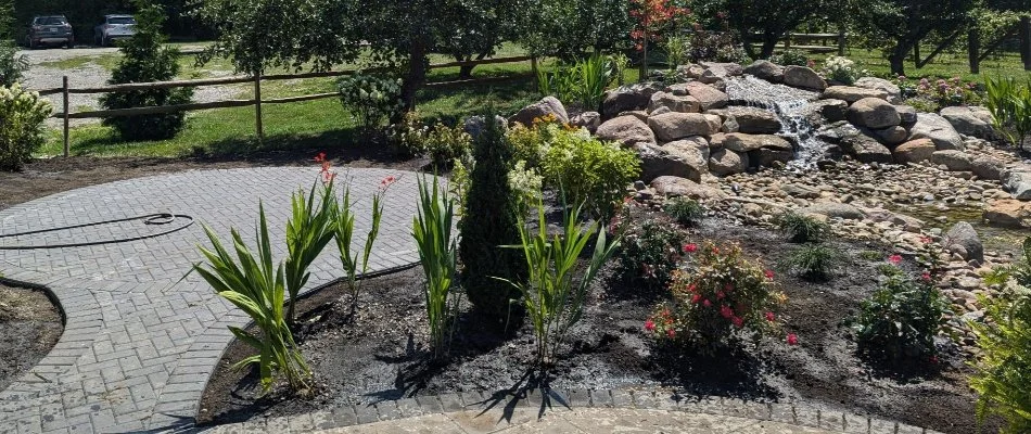 Patio, plants, and water feature in Middle Bass, OH.