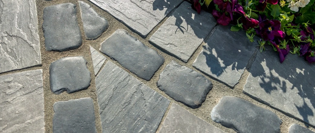 Paver patio in Huron, OH, at the back of a house.