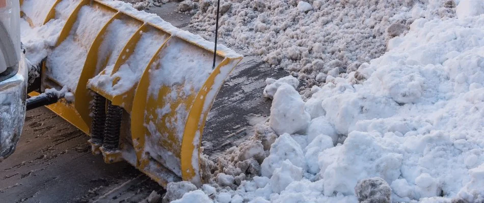 Plowing snow from an icy road in Bay Village, OH.